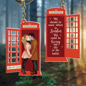We Could Be Loving Our Life In The Rain, Personalized Kissing Couple At Telephone Booth Keychain, Gift For Couple, Valentine's Gifts - Keychains - GoDuckee