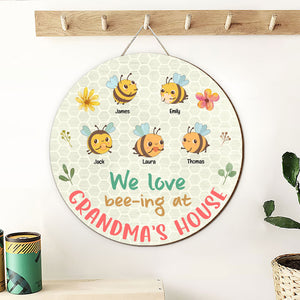 We Love Bee-ing At Grandma's House, Personalized Round Wooden Sign, Gift For Grandma - Wood Sign - GoDuckee
