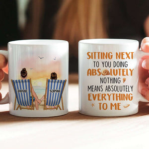 Sitting Next To You Doing Absolutely Nothing, Personalized White Mug, Couple Hand In Hand, Gift For Couple - Coffee Mug - GoDuckee