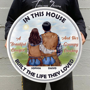 Cowboy Couple In This House They Built The Life They Loved Personalized Round Wooden Sign - Wood Sign - GoDuckee