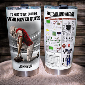 Personalized Kneeling Football Player Tumbler - Knowledge It's Hard To Beat Someone Who Never Quits - Tumbler Cup - GoDuckee
