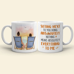 Sitting Next To You Doing Absolutely Nothing, Personalized White Mug, Couple Hand In Hand, Gift For Couple - Coffee Mug - GoDuckee
