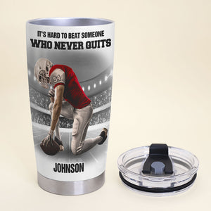 Personalized Kneeling Football Player Tumbler - Knowledge It's Hard To Beat Someone Who Never Quits - Tumbler Cup - GoDuckee