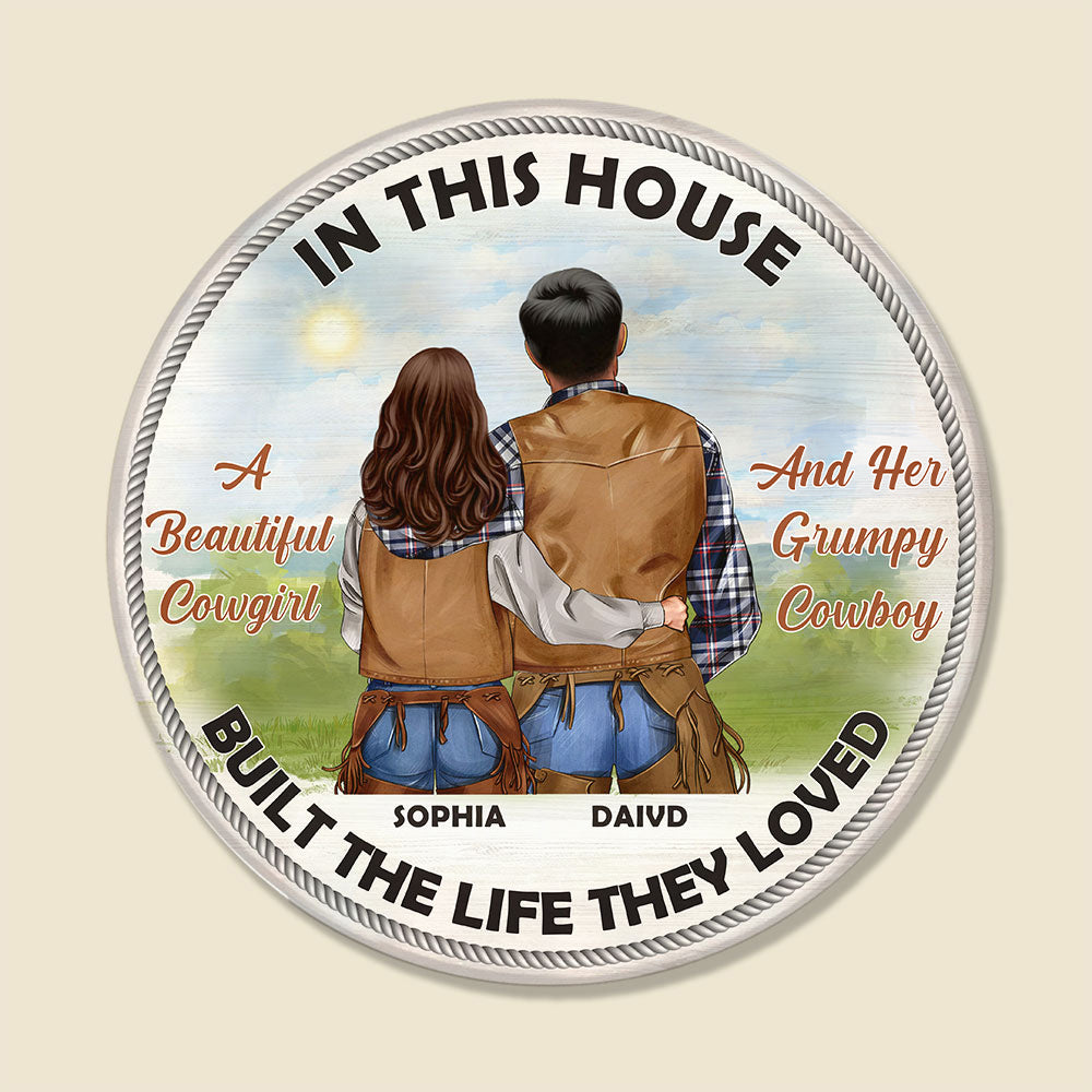 Cowboy Couple In This House They Built The Life They Loved Personalized Round Wooden Sign - Wood Sign - GoDuckee