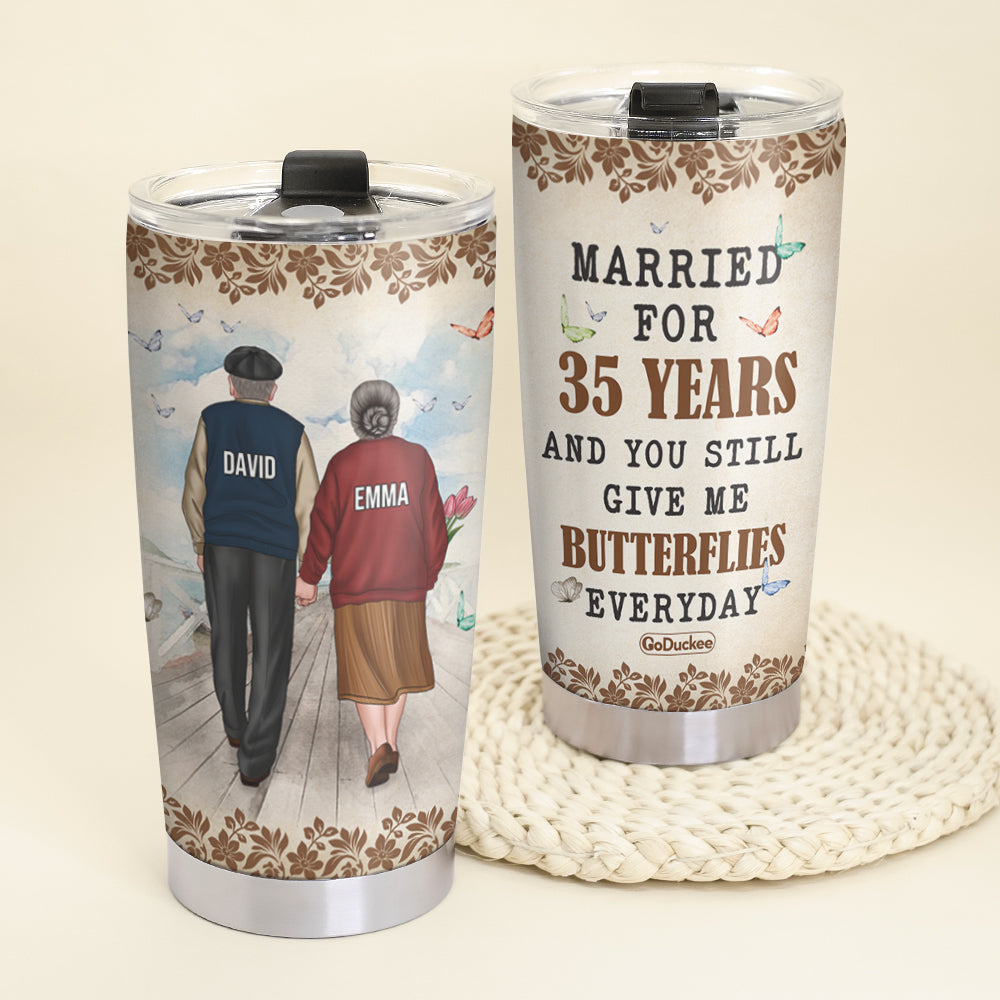 Personalized Old Couple Tumbler - You Still Give Me Butterflies - Old Couple Hand In Hand Back View - Tumbler Cup - GoDuckee