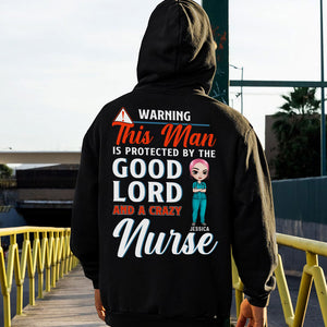 Personalized Nurse's Husband Shirts - Warning This Man Is Protected By The Good Lord And A Crazy Nurse - Shirts - GoDuckee