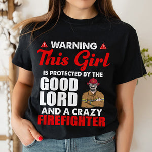 Personalized Firefighter Wife Shirts - This girl is protected by the Good lord and crazy Firefighter - Shirts - GoDuckee